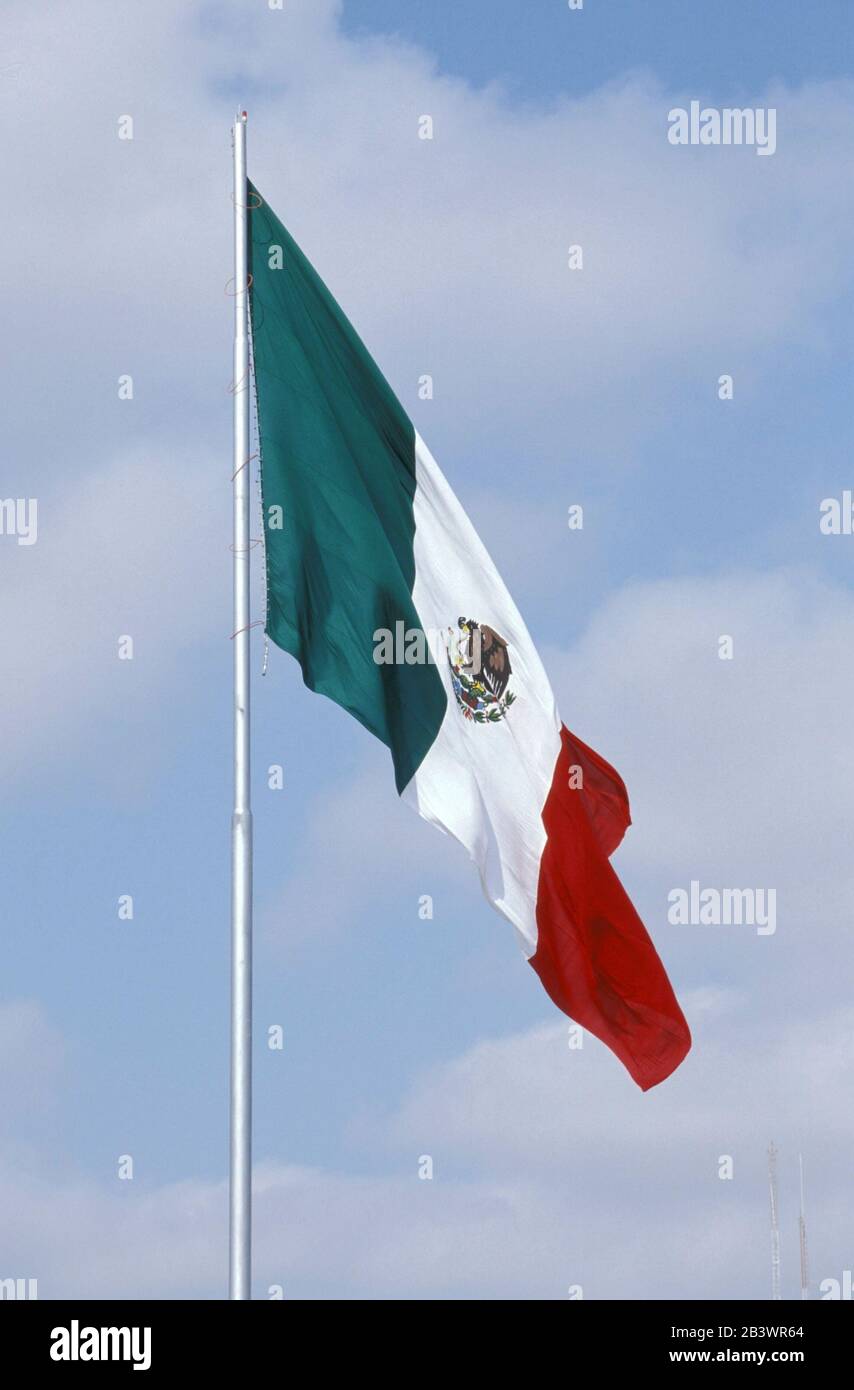 Mexican flag on flagpole Stock Photo - Alamy