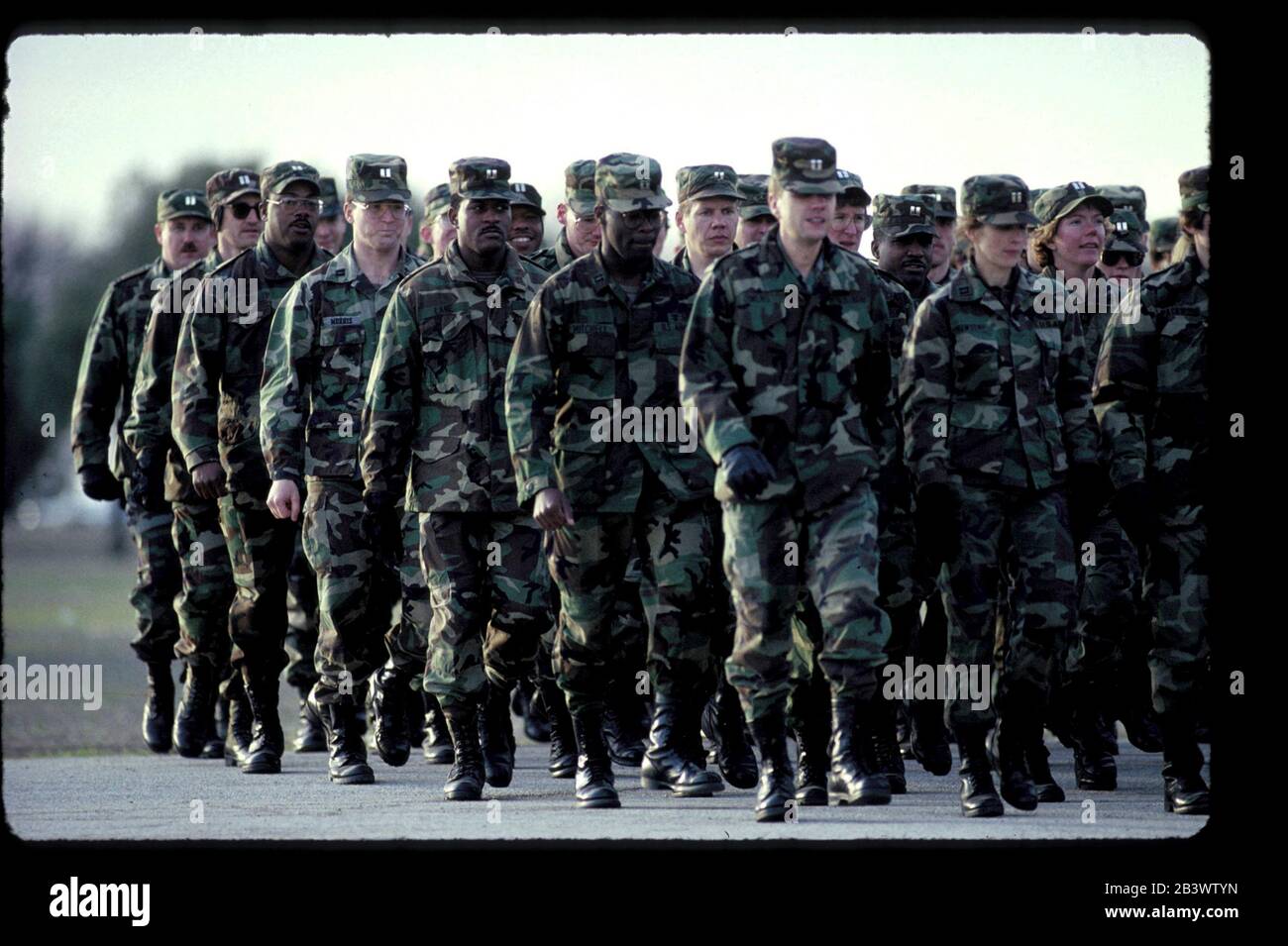 San Antonio Texas USA: U.S. Army soldiers march in formation during exercises at Fort Sam Houston. ©Bob Daemmrich Stock Photo