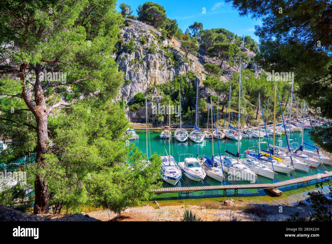 White boats in Calanque de Port Miou, one of the biggest fjords in Cassis, Provence, France Stock Photo