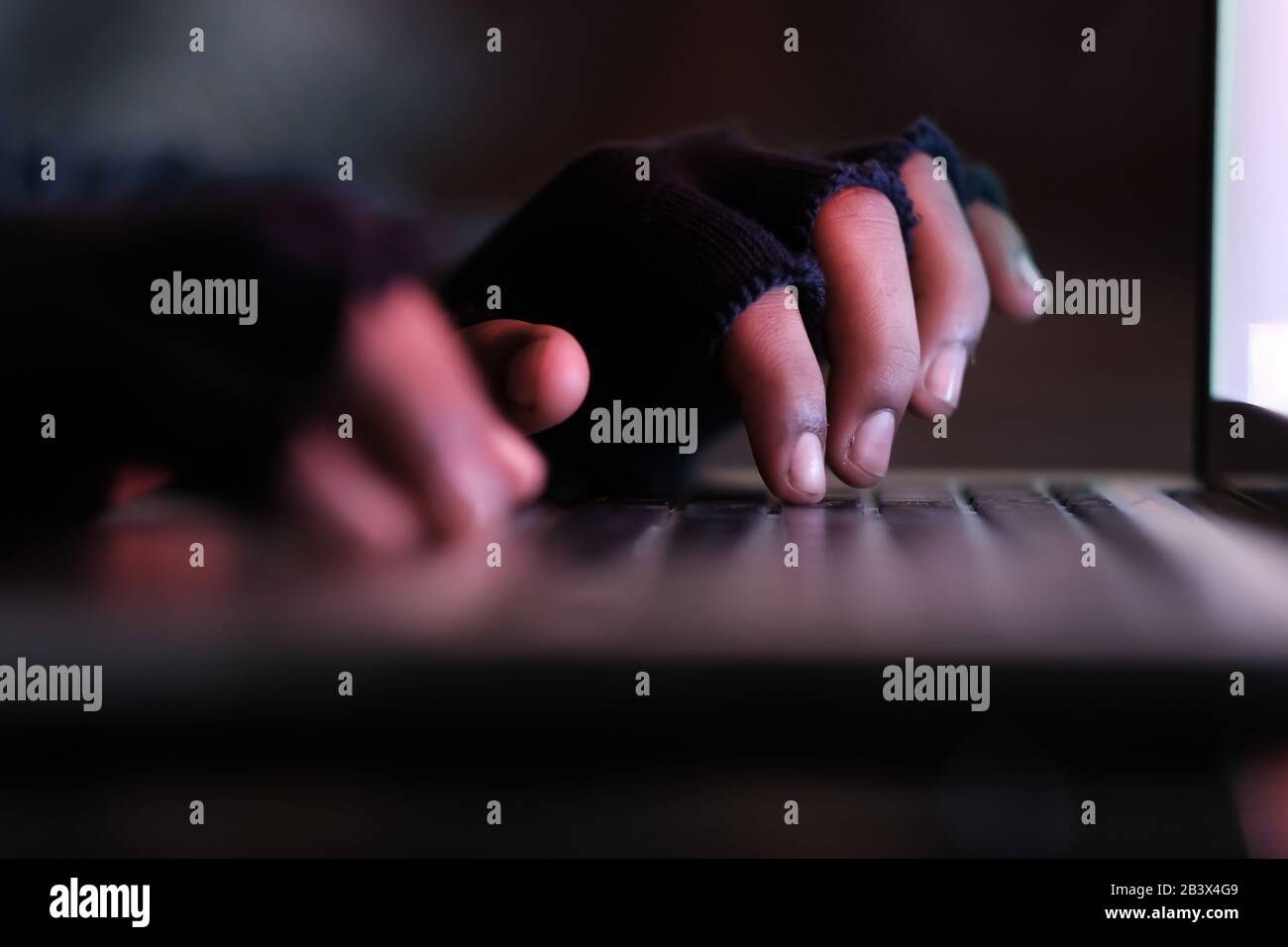 hacker stealing data laptop laptop, closeup  Stock Photo