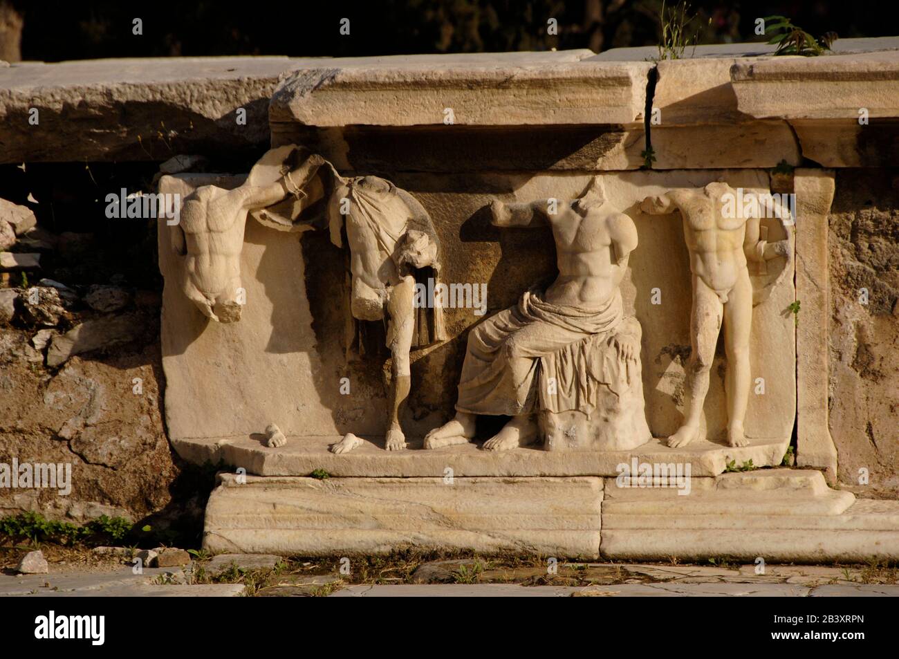 Greece, Athens. Stage relief from the Theatre of Dionysus. Roman Age. 2nd century BC. Back of the stage. Relief depicting a scene from the myth of Dionysus. Stock Photo