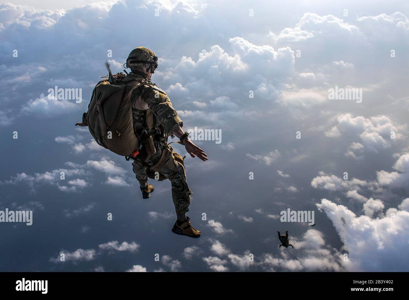 U.S. Airmen from the 82nd Expeditionary Rescue Squadron perform a military free fall jump in Djibouti, Africa, April 17, 2018. The 82nd ERQS members a Stock Photo