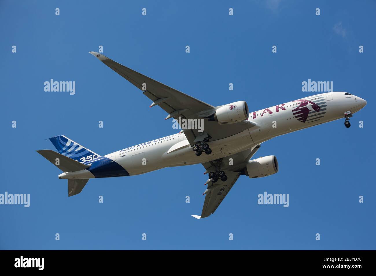 Farnborough, UK - July 15, 2014: Airbus flies the A350 XWB at the Farnborough Int'l Airshow, in the colors of Qatar Airways as launching customer for Stock Photo