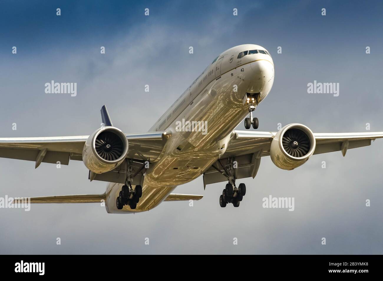 LONDON, ENGLAND - NOVEMBER 2018: Saudi Arabian Airlines Boeing 777 jet coming in to land at London Heathrow Airport. Stock Photo