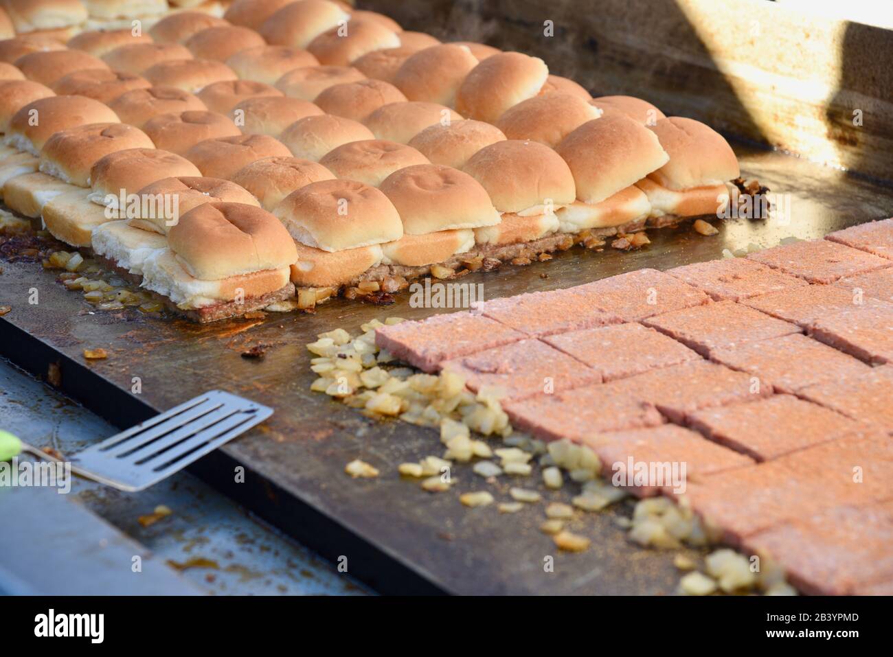 Grilled vegan, plant-based protein (fake meat) 'beef' Impossible Burgers for White Castle sliders sampled by attendees at CES, Las Vegas, NV, USA Stock Photo