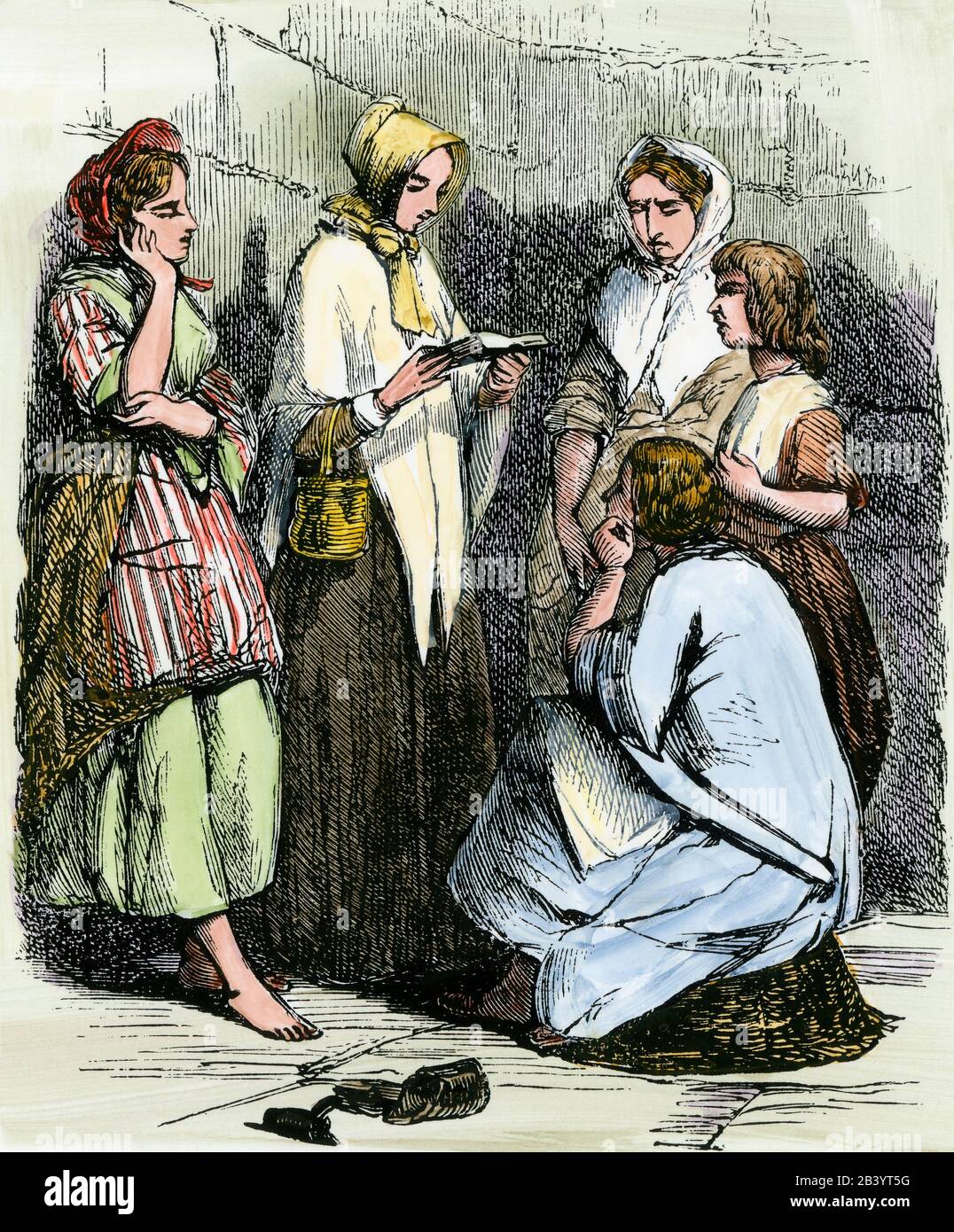 Elizabeth Fry reading the Bible to inmates of Newgate Prison, early 1800s. Hand-colored woodcut Stock Photo