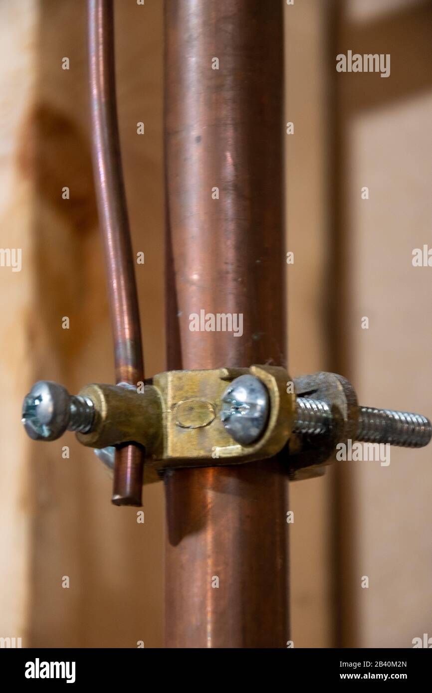 electrical grounding and jumper cable on copper piping Stock Photo Alamy
