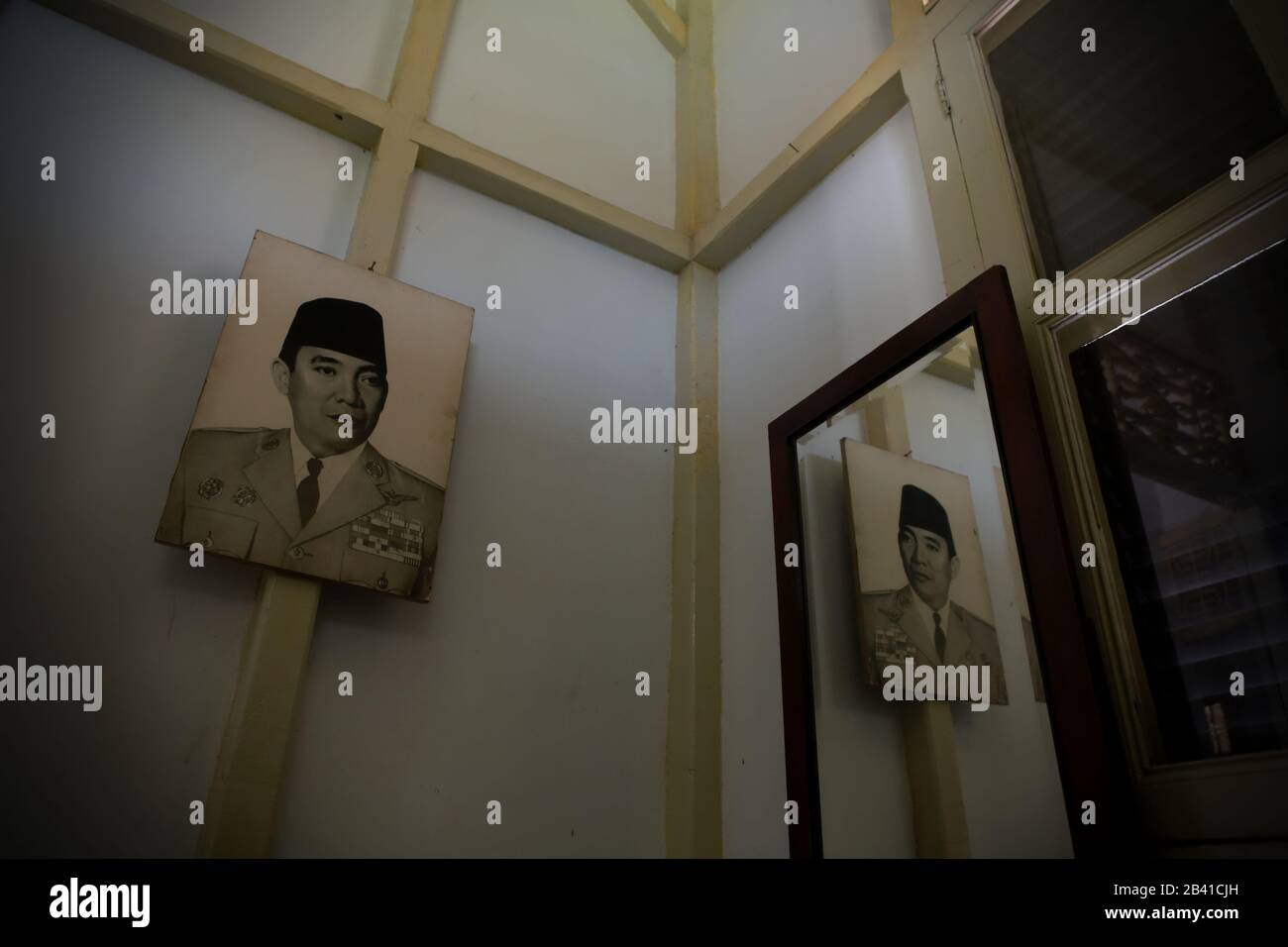 Printed photo of Indonesian first president Soekarno in a bedroom where he spent his exile time several years in Bengkulu, Indonesia. Stock Photo
