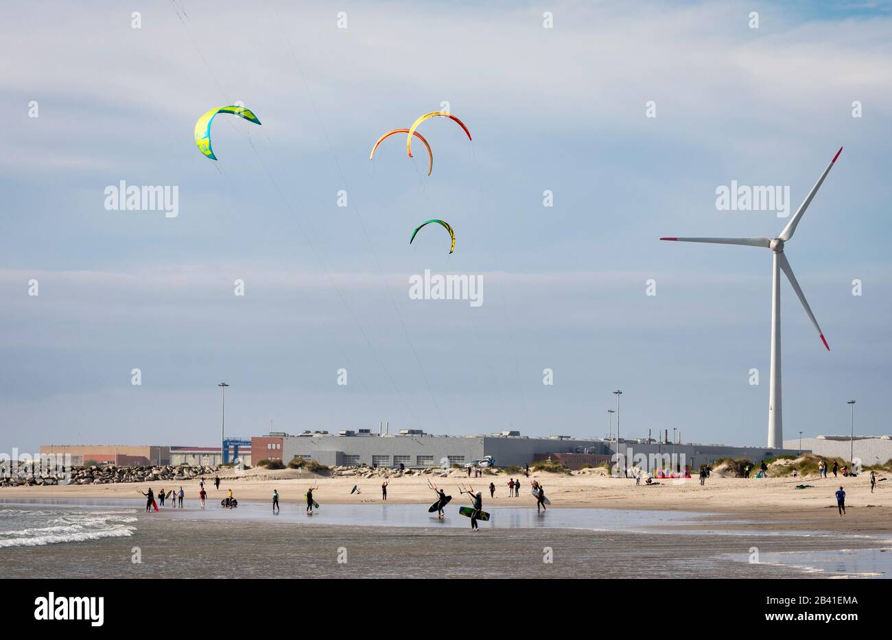 People practicing kitesurf at the beach in Portugal Stock Photo