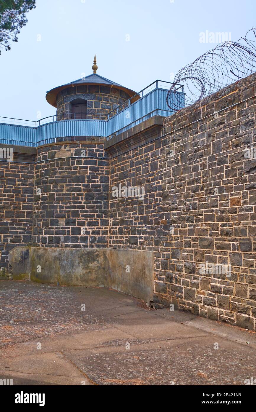 A corner security guard watchtower atop a stone wall at the J Ward goal