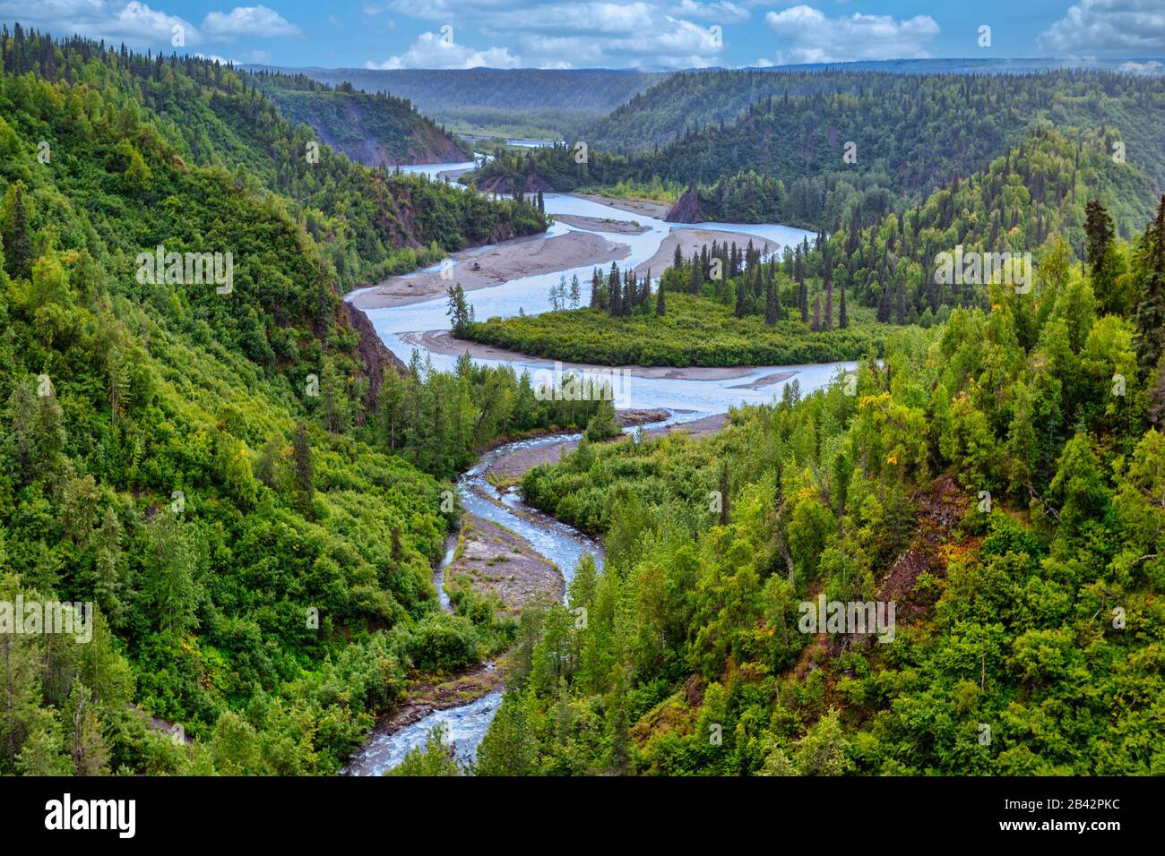 River Flowing Through a Valley in Boreal Forest, Alaska, USA Stock Photo
