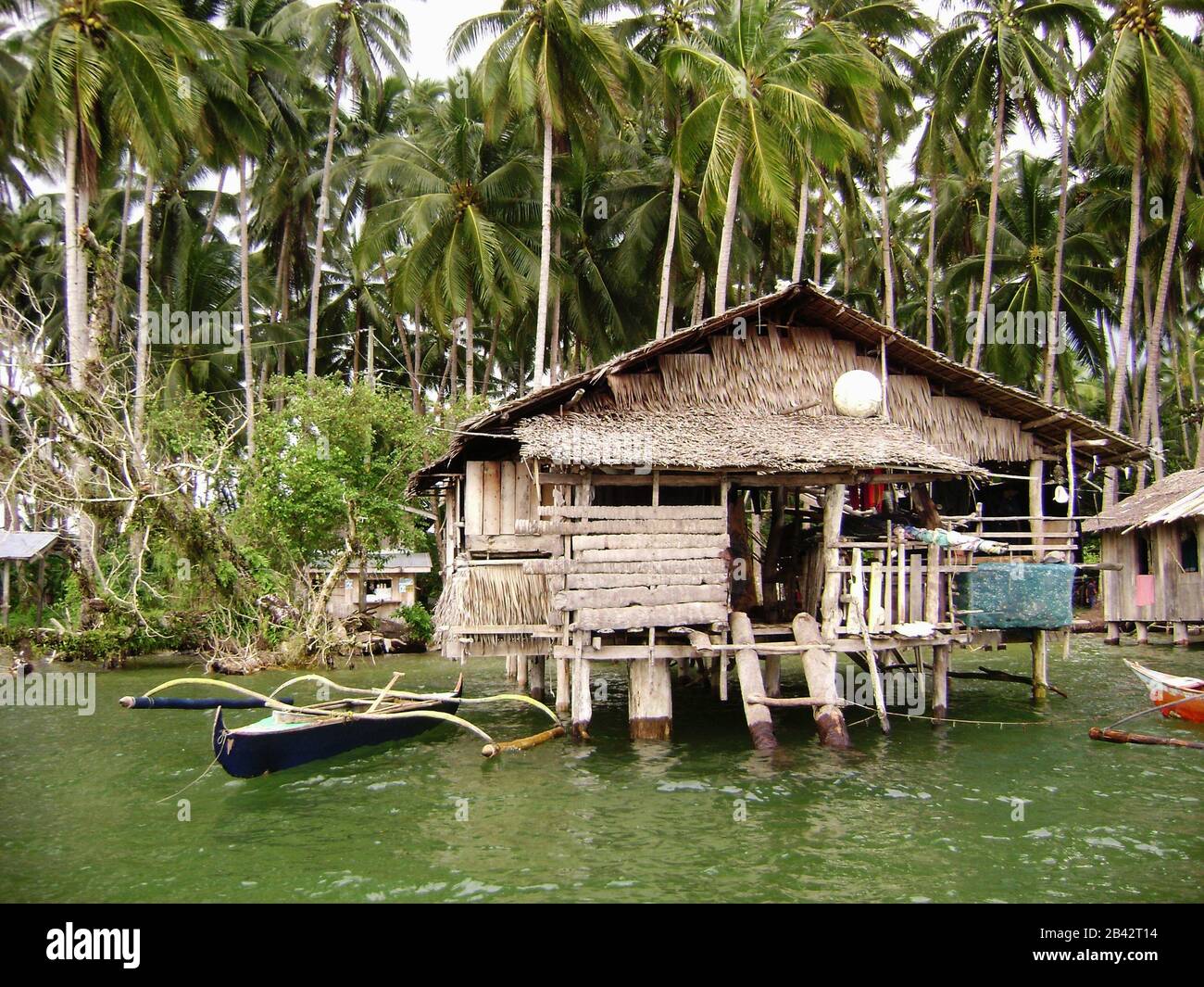 Houses on stilts in a fishing village in Surigao del Sur, Philippines Stock Photo