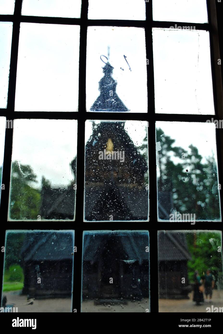 Window view of Gol Stave Church (Norwegian: Gol stavkyrkje), a reconstructed church in the Norwegian Museum of Cultural History near Oslo, Norway. Stock Photo