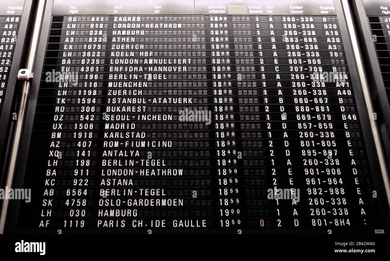 Retro information board at the Frankfurt International Airport in Germany displays departure information for mostly European cities. Stock Photo