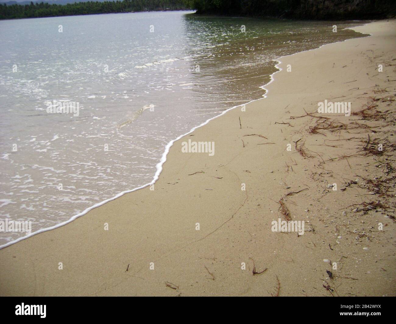 Closer photo of a beach with fine, white sand in Surigao del Sur, Philippines. Stock Photo