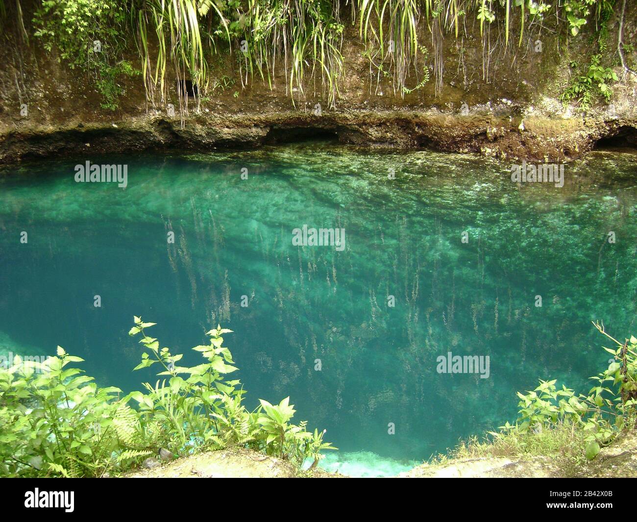 Deep green waters at the Enchanted River of Surigao del Sur, Philippines. Stock Photo