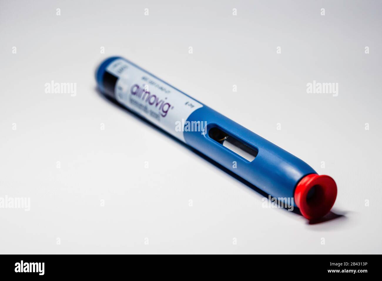Aimovig (erenumab-aooe) 140 mg auto-injector device, prescription drug for migraine prevention, studio, color, United States Stock Photo