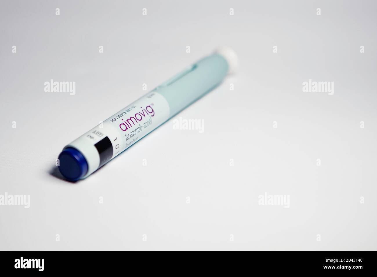 Aimovig (erenumab-aooe) 70 mg auto-injector device, prescription drug for migraine prevention, studio, color, United States Stock Photo