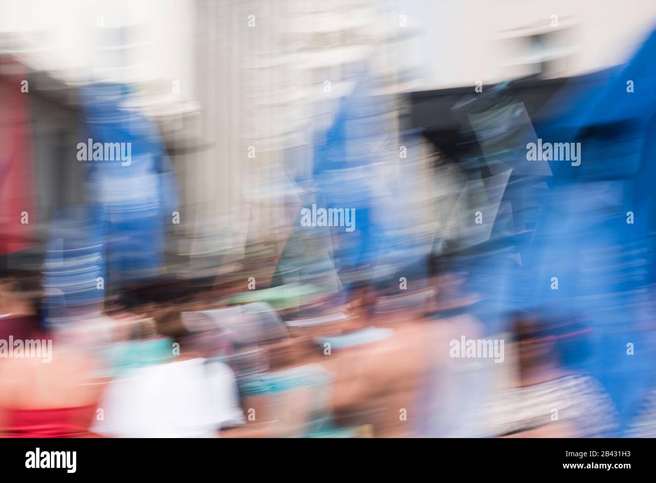 Crowd of people in motion blur, participants of a demonstration, unrecognizable, generic, urban Stock Photo