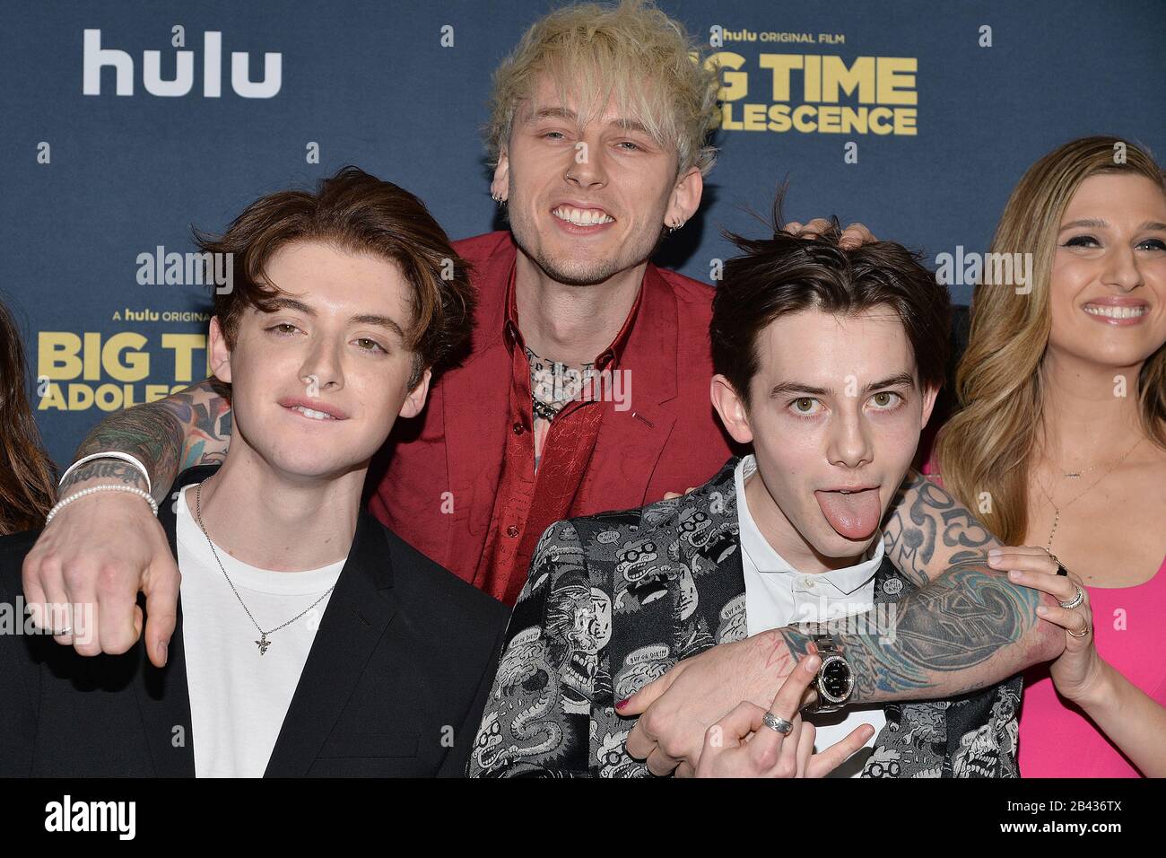 New York, USA. 05th Mar, 2020. (L-R) Thomas Barbusca, Rapper Machine Gun Kelly (Colson Baker), Griffin Gluck and Emily Arlook attend the premiere of Hulu's 'Big Time Adolescence' at Metrograph in New York, NY, March 5, 2020. (Photo by Anthony Behar/Sipa USA) Credit: Sipa USA/Alamy Live News Stock Photo