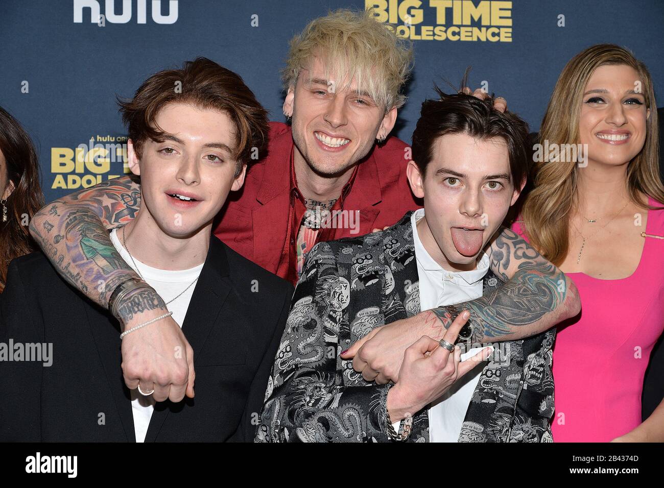 New York, USA. 05th Mar, 2020. (L-R) Thomas Barbusca, Rapper Machine Gun Kelly (Colson Baker), Griffin Gluck and Emily Arlook attend the premiere of Hulu's 'Big Time Adolescence' at Metrograph in New York, NY, March 5, 2020. (Photo by Anthony Behar/Sipa USA) Credit: Sipa USA/Alamy Live News Stock Photo