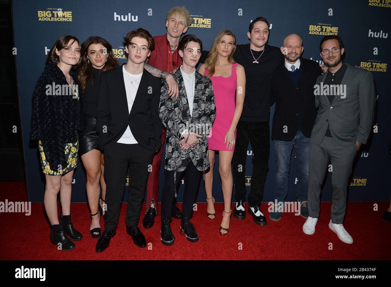 New York, USA. 05th Mar, 2020. (L-R) Oona Laurence, Brielle Barbusca, Thomas Barbusca, Colson Baker AKA Machine Gun Kelly, Griffin Gluck, Emily Arlook, Pete Davidson, Jon Cryer and Joason Orley attend the premiere of Hulu's 'Big Time Adolescence' at Metrograph in New York, NY, March 5, 2020. (Photo by Anthony Behar/Sipa USA) Credit: Sipa USA/Alamy Live News Stock Photo
