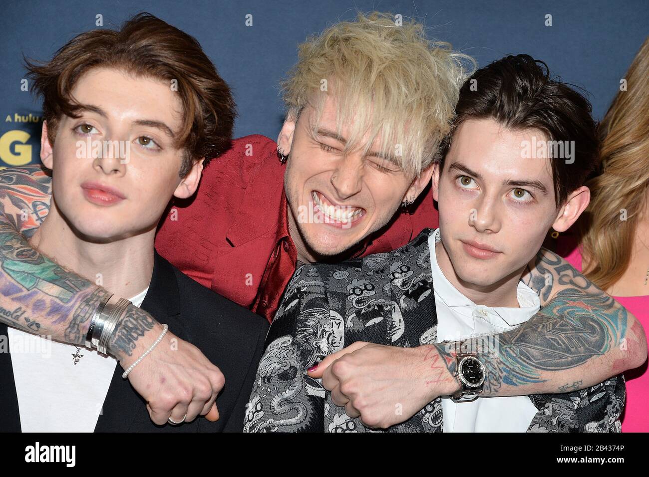 New York, USA. 05th Mar, 2020. (L-R) Thomas Barbusca, Rapper Machine Gun Kelly (Colson Baker) and Griffin Gluck attend the premiere of Hulu's 'Big Time Adolescence' at Metrograph in New York, NY, March 5, 2020. (Photo by Anthony Behar/Sipa USA) Credit: Sipa USA/Alamy Live News Stock Photo