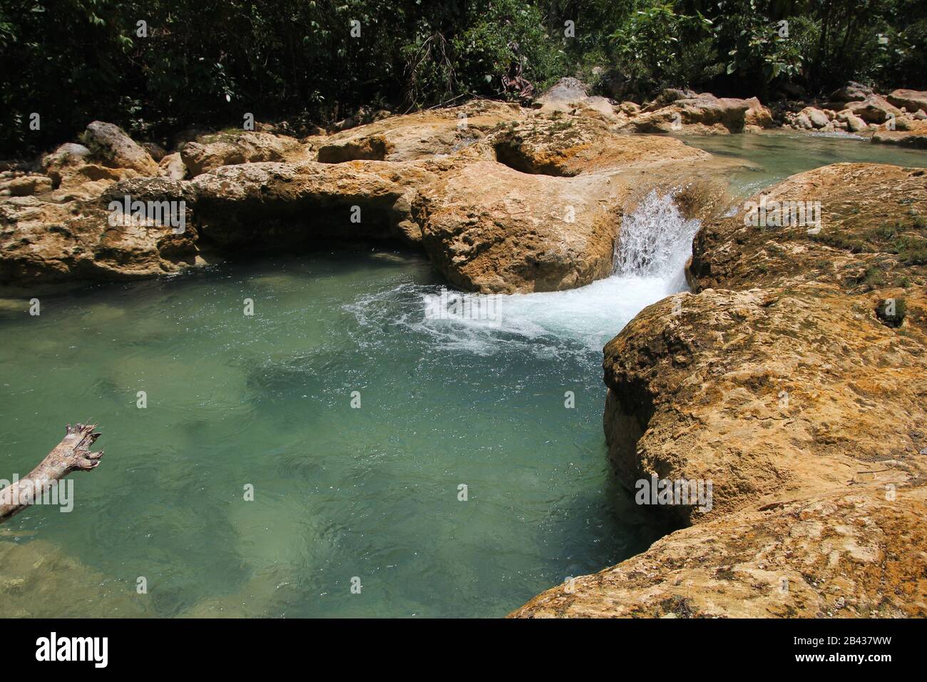 Clear pool from the flowing waters of Baobao Falls, an attraction in Liangga, Surigao del Sur, Philippines. Stock Photo