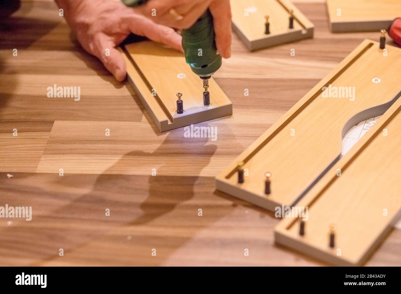 Side view and close up photo of carpenter person with professional ...