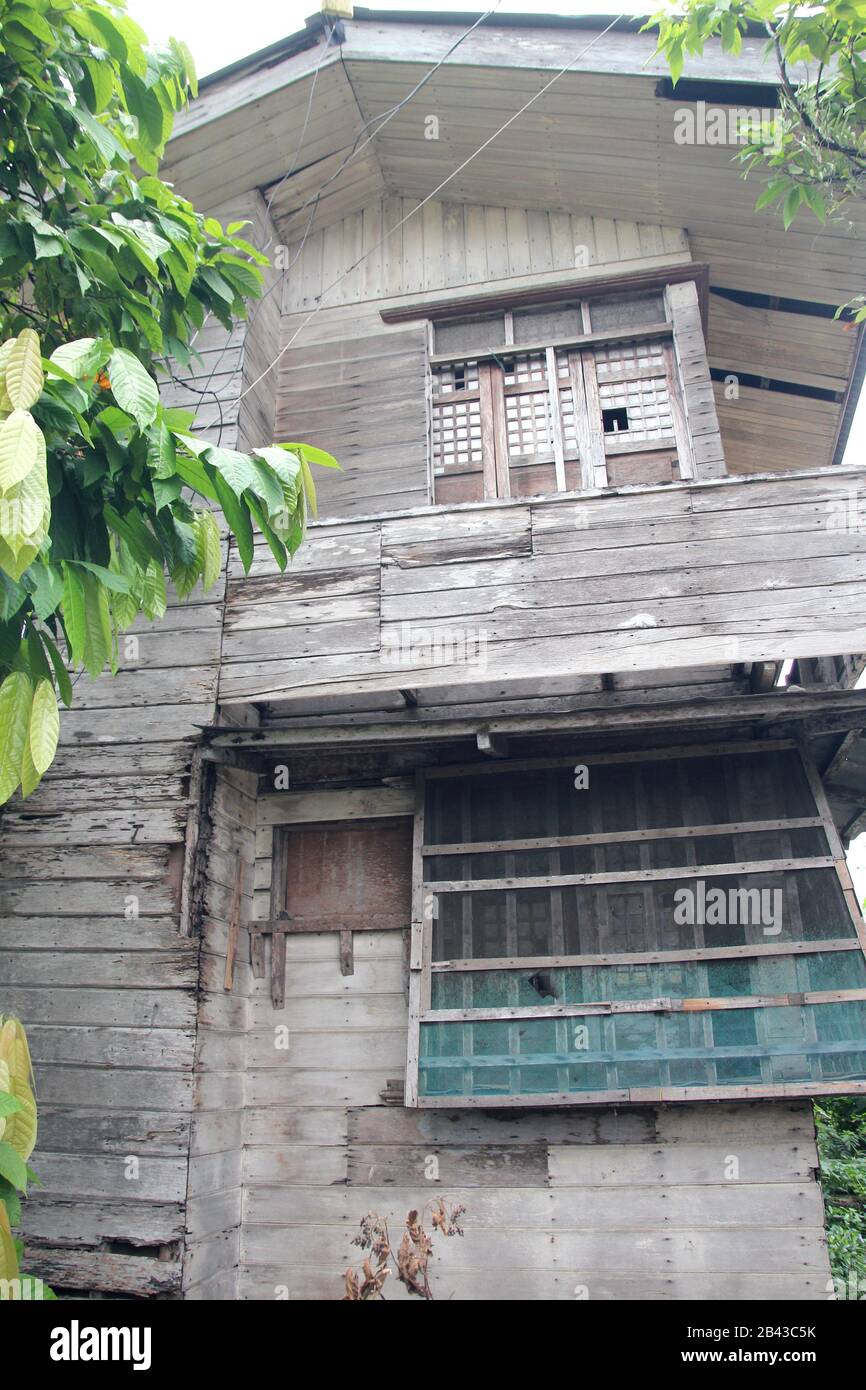 Dilapidated ancestral wooden house, southern Philippines. Stock Photo