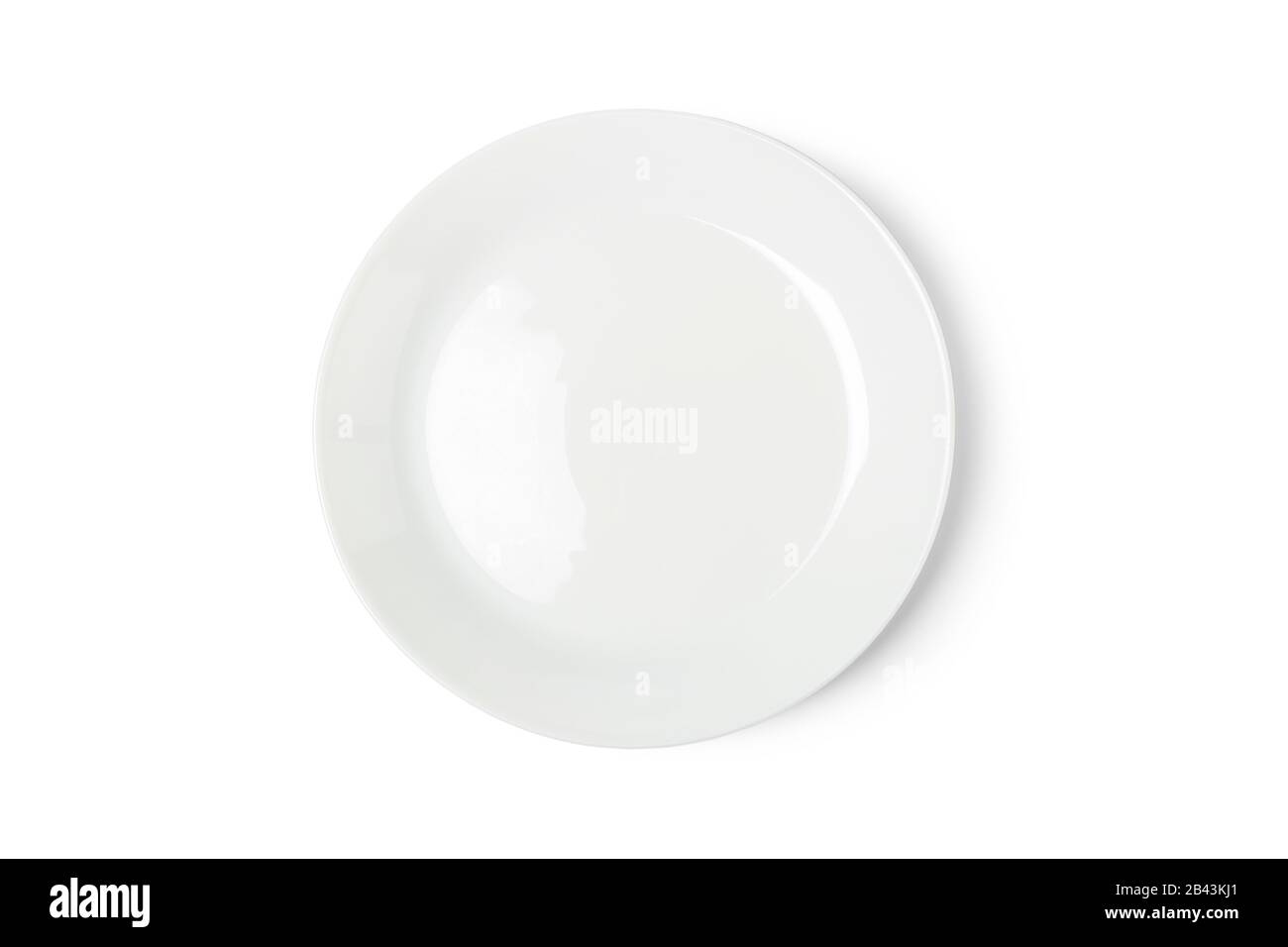 White porcelain plate isolated on white background Stock Photo - Alamy