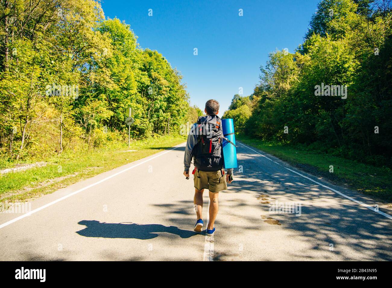 Healthy man large backpack walks hi-res stock photography and images ...