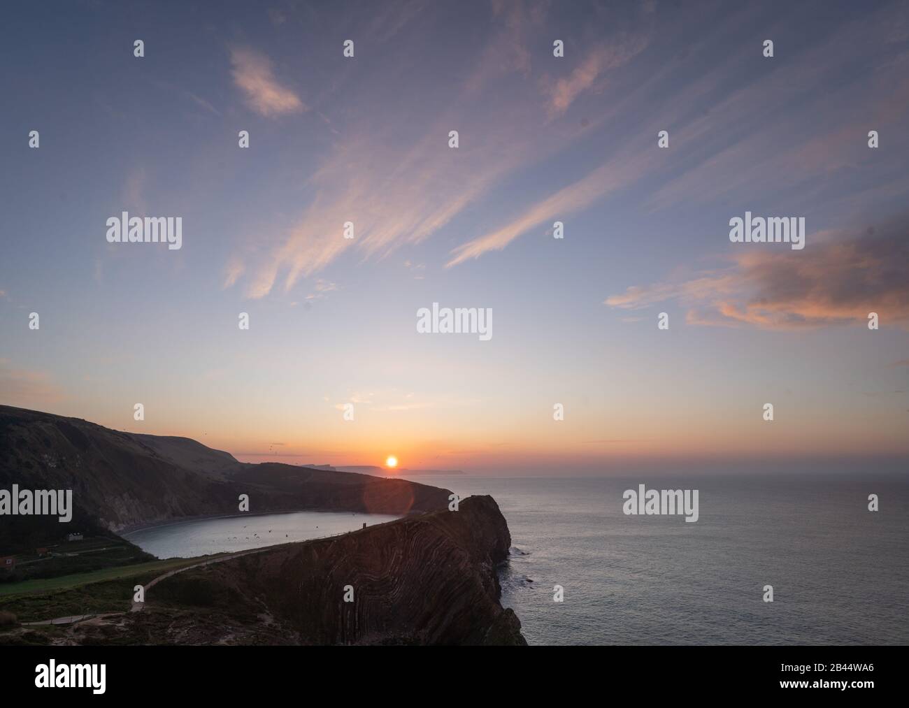 Lulworth Cove, Dorset, UK. 6th March 2020. UK Weather. Crisp colourful sunrise on the south coast. Credit: DTNews/Alamy Live News Stock Photo