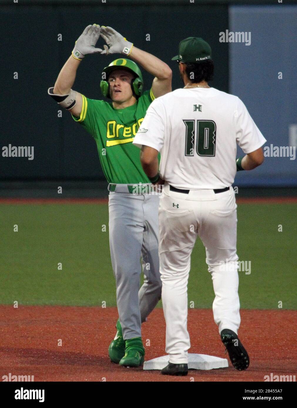 March 5, 2020 - Oregon Ducks outfielder Tanner Smith (310 shows an 'O' to the dugout after hitting a double in the first inning of a game between the Oregon Ducks and the Hawaii Rainbow Warriors at Les Murakami Stadium in Honolulu, HI - Michael Sullivan/CSM Stock Photo