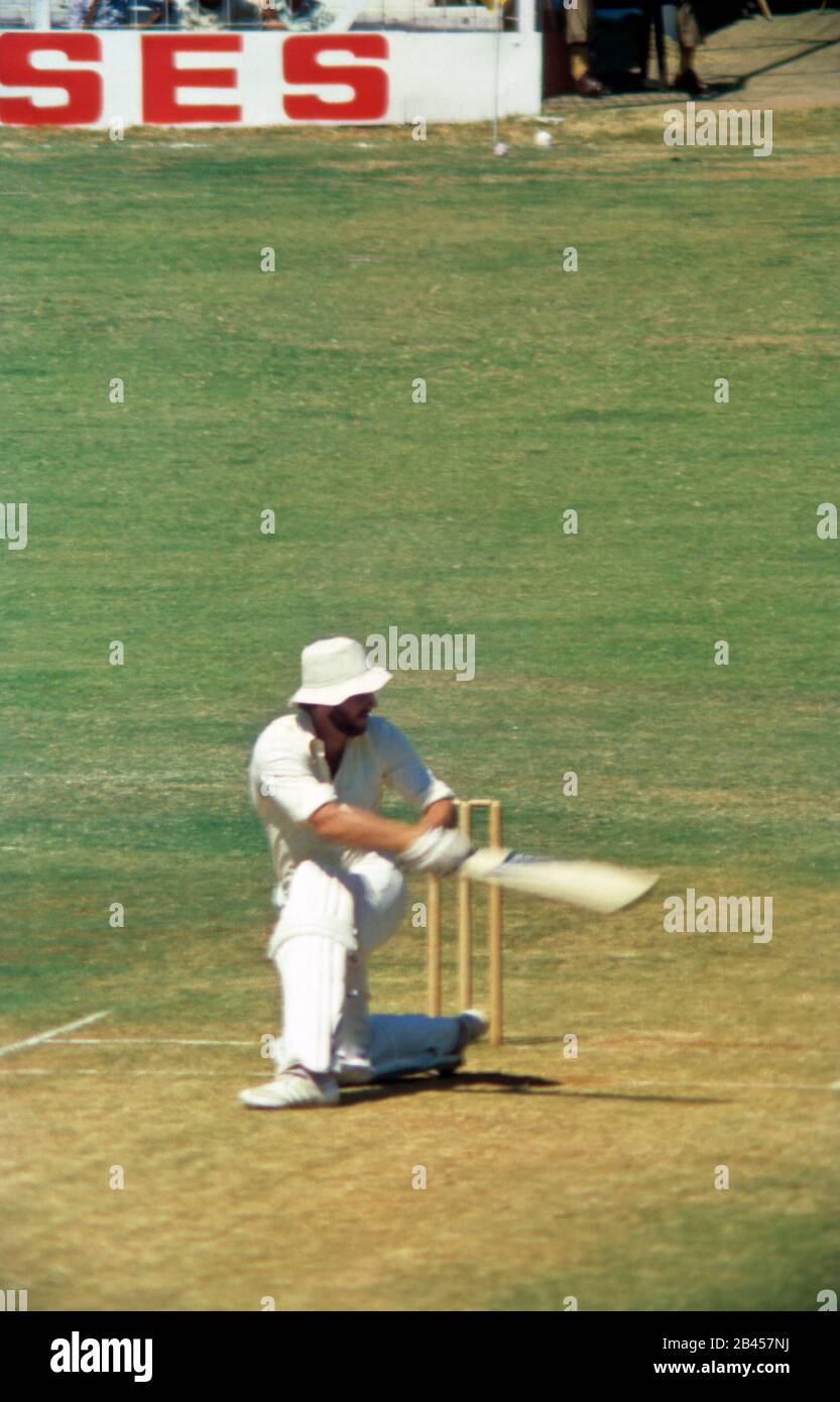 Cricket batsman playing sweep shot, India, Asia Stock Photo Alamy