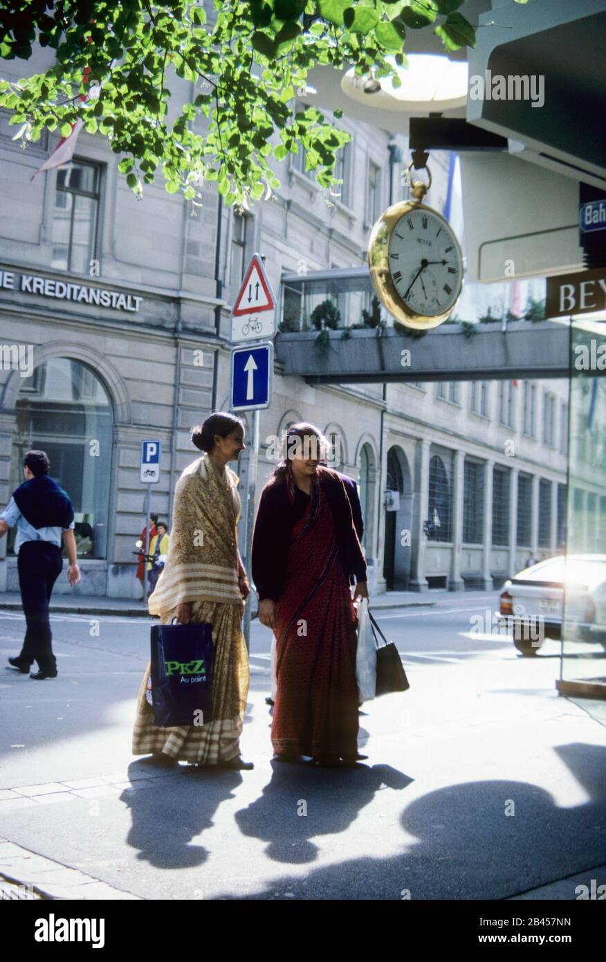 Two Indian women in front of Credit Suisse Group building, Schweizerische Kreditanstalt, Zurich, Switzerland, Europe Stock Photo