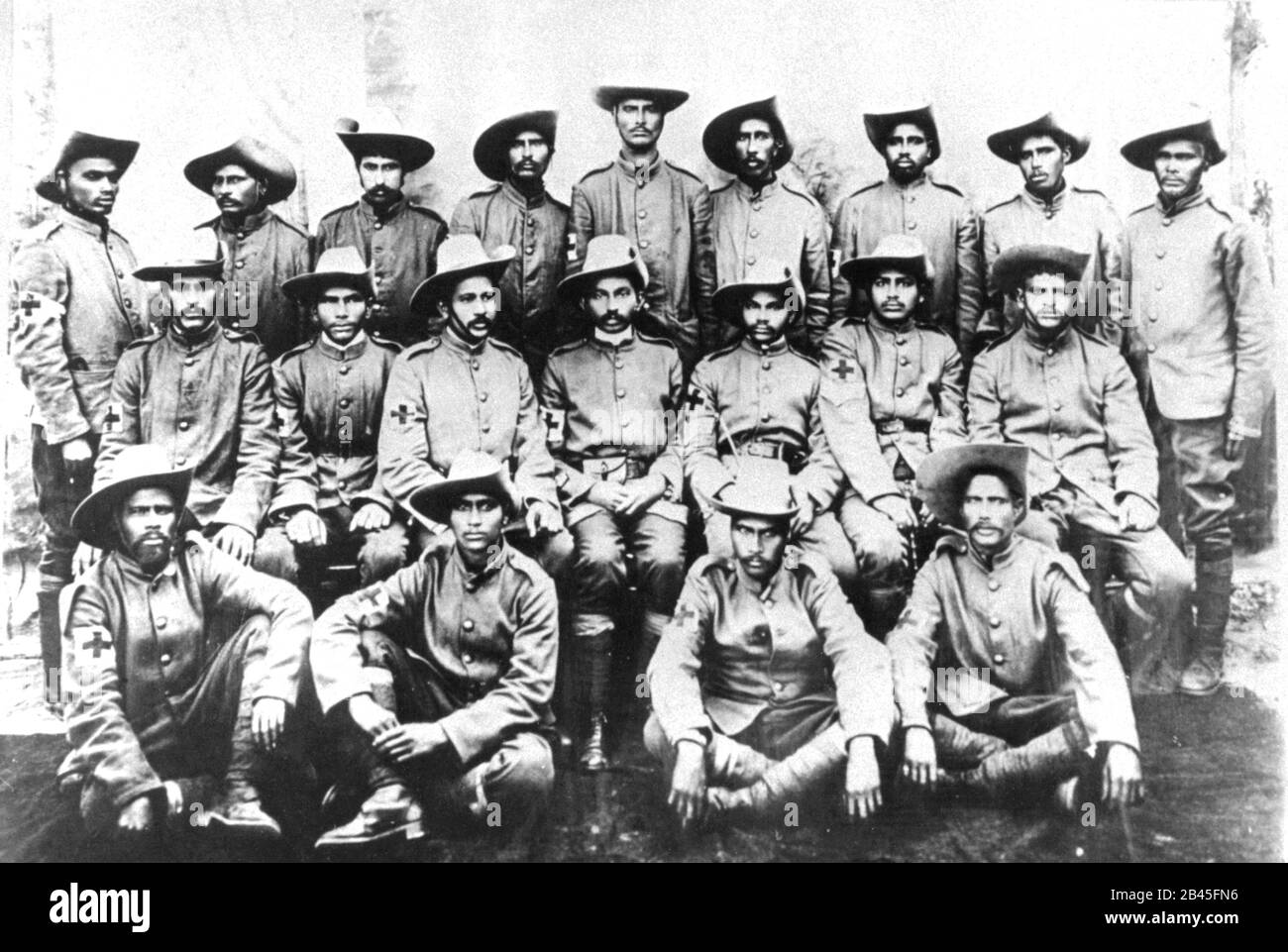 Mahatma Gandhi in center, Natal Indian Ambulance Corps, volunteer Indian Ambulance Corps stretcher bearers during Bambatha Rebellion, Zulu Rebellion, South Africa, 1906, old vintage 1900s picture Stock Photo