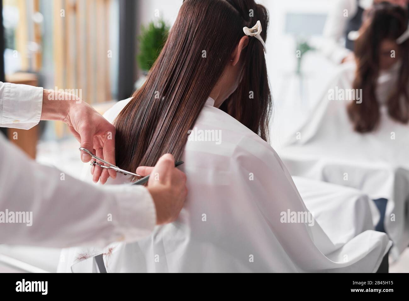 Rear view, long straight hair hi-res stock photography and images - Alamy
