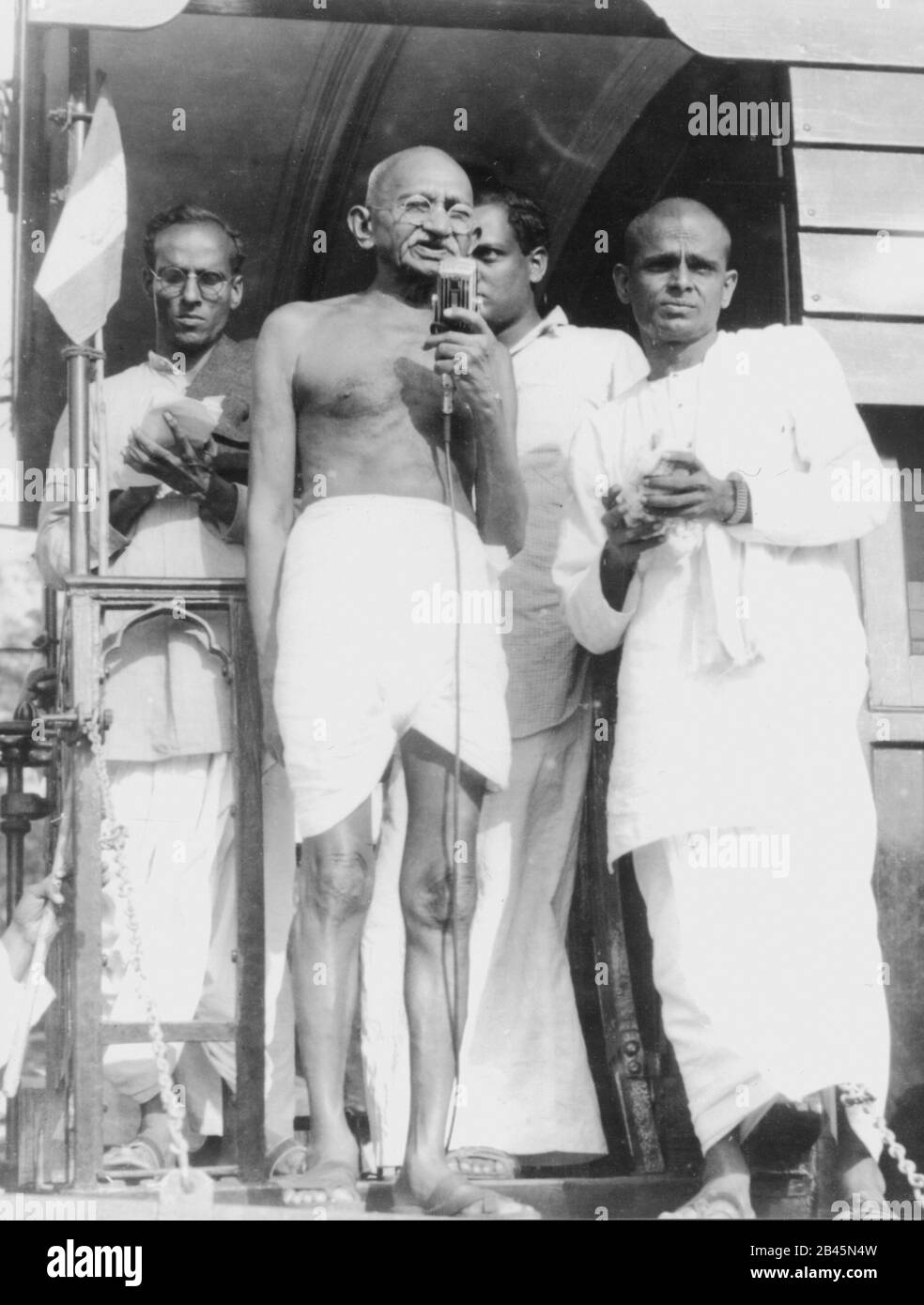 Mahatma Gandhi talking on microphone from a train compartment, Madras, Chennai, Tamil Nadu, India, Asia, February 1946, old vintage 1900s picture Stock Photo