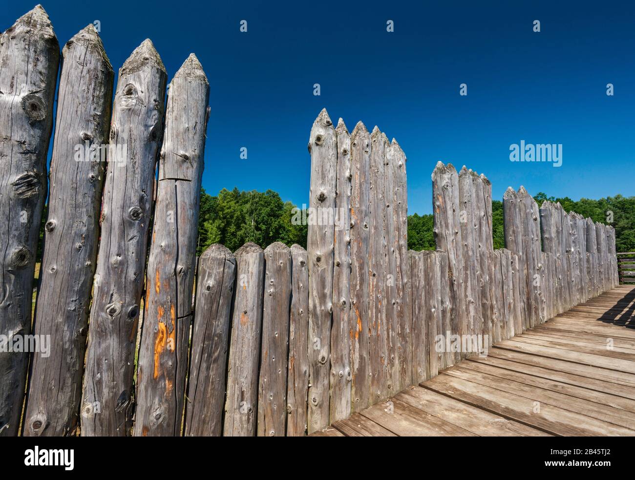 Timberlaced palisade rampart, 8th-10th century AD, reconstruction, Carpathian Troy Archaeological Open-Air Museum in Trzcinica, Malopolska, Poland Stock Photo