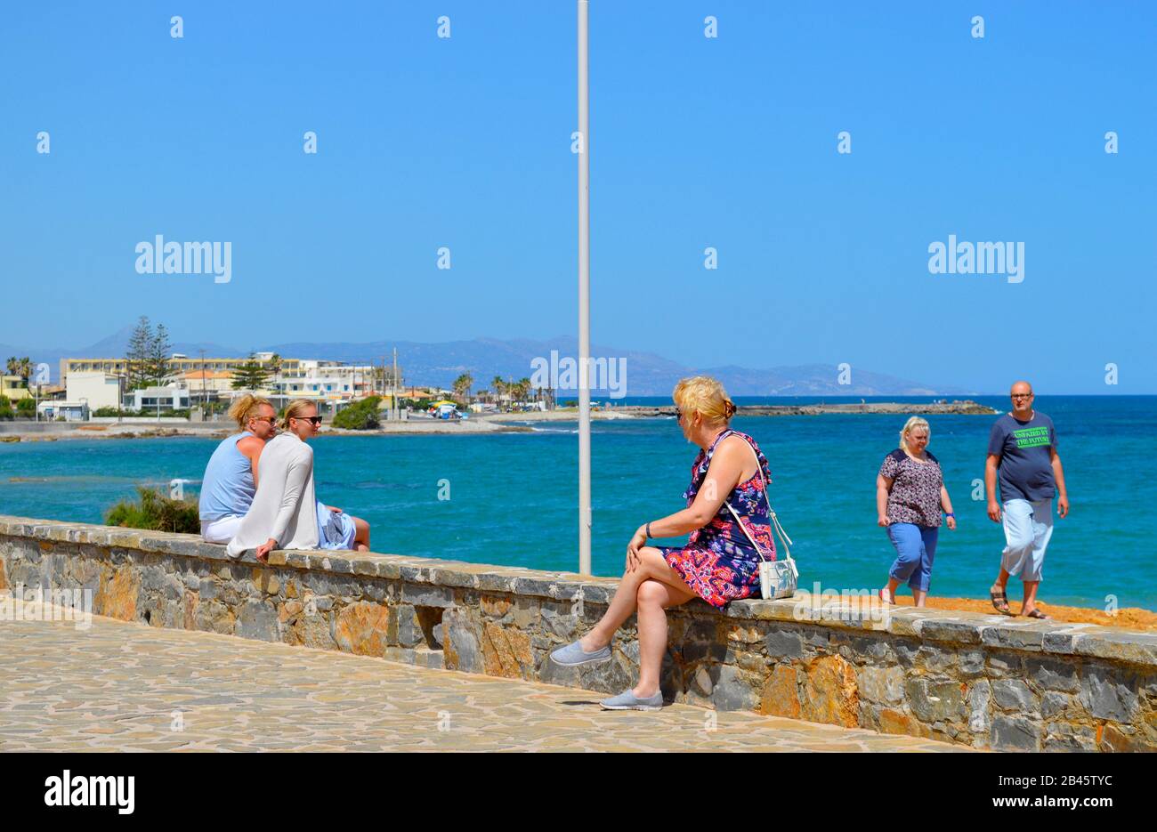Tourists on Gouves coast in Crete the largest and most populated of the
