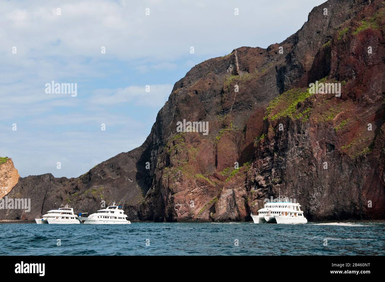 Cruise boat at Vincente Roca Point on Isla Isabela (isabela Island), Galapagos Islands, Ecuador. Stock Photo