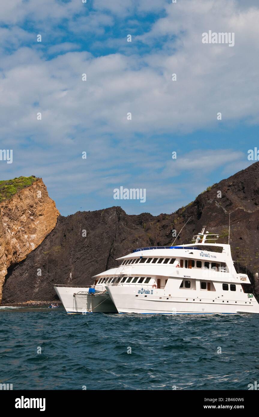 Cruise boat at Vincente Roca Point on Isla Isabela (isabela Island), Galapagos Islands, Ecuador. Stock Photo