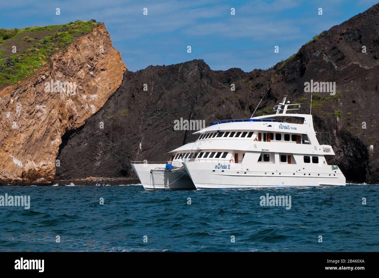 Cruise boat at Vincente Roca Point on Isla Isabela (isabela Island), Galapagos Islands, Ecuador. Stock Photo
