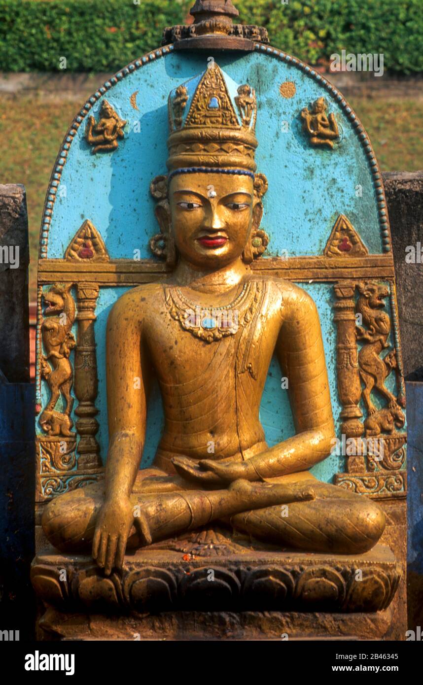 huge gilded buddha, his hands touching the earth at samadhi, Mahabodhi