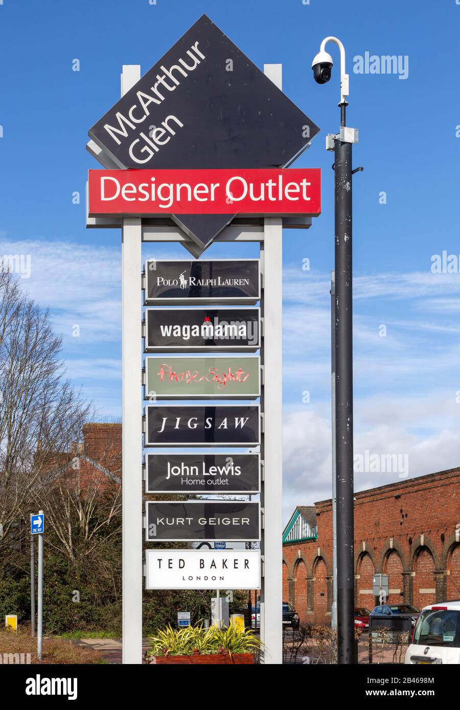 McArthur Glen designer outlet sign listing some of the shops, Swindon,  Wiltshire, England, UK Stock Photo - Alamy