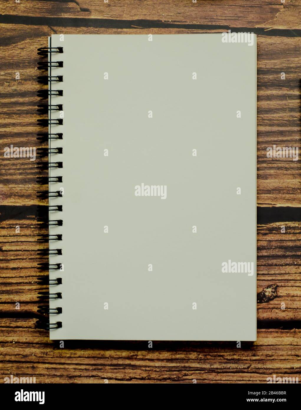 Notepad on wooden table Stock Photo Alamy