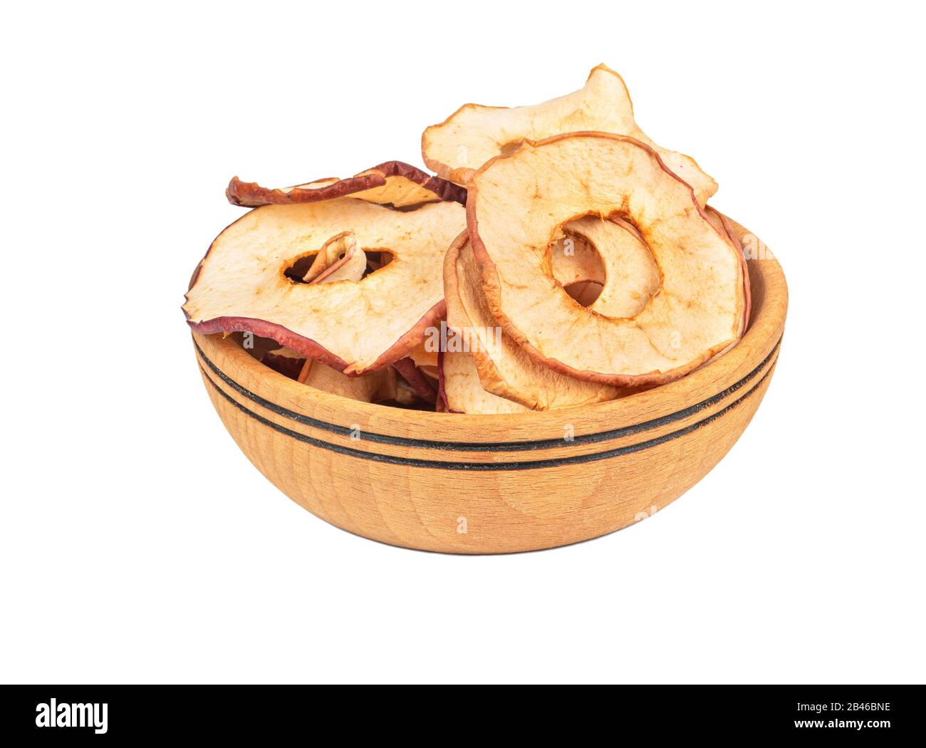 Apple chips in a wooden bowl on a white background Stock Photo