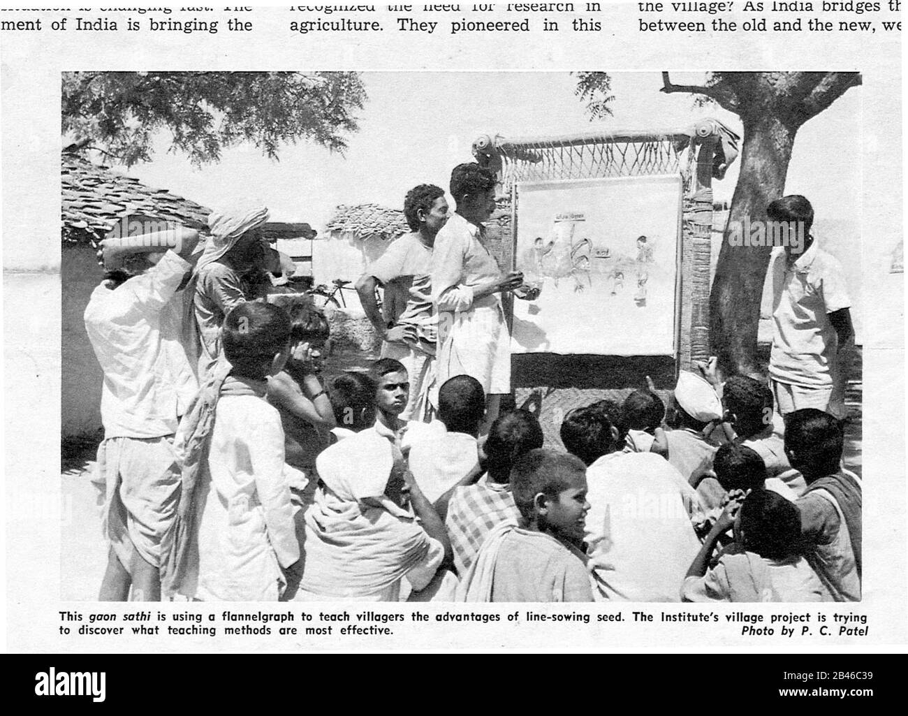 Using flannelgraph teaching village men advantage of line sowing seed, Allahabad, Uttar Pradesh, India, Asia, 1955, old vintage 1900s picture Stock Photo
