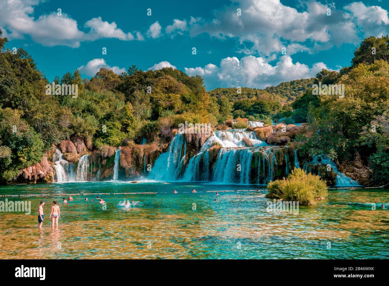 KRKA waterfalls Croatia September , krka national park Croatia on a bright summer evening with people relaxing in the water Stock Photo